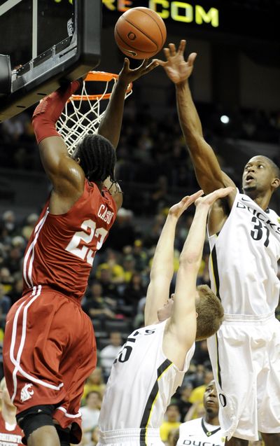 Washington State's DeAngelo Casto (23) has a shot blocked by Oregon's Tyrone Nared (31). (Greg Wahl-stephens / Fr29287 Ap)