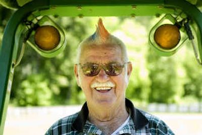 
Hank Hayden mows a baseball field last month in Ridgefield, Wash. Associated Press
 (Associated Press / The Spokesman-Review)