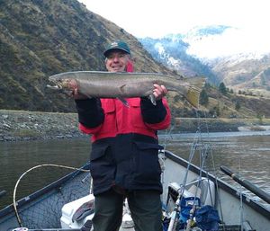 Mike Durning with his 35-inch hatchery steelhead caught Nov. 5, 2011, onl the Salmoln River with drift boat guide Brent Sawyer of Exodus Wilderness Adventures.

 

 (Exodus Wilderness Adventures)