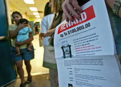 
Hundreds gathered Wednesday for a meeting at the Loma Linda School cafeteria hosted by the Phoenix Police Department in response to reports of two serial killers in the city. One, the so-called 