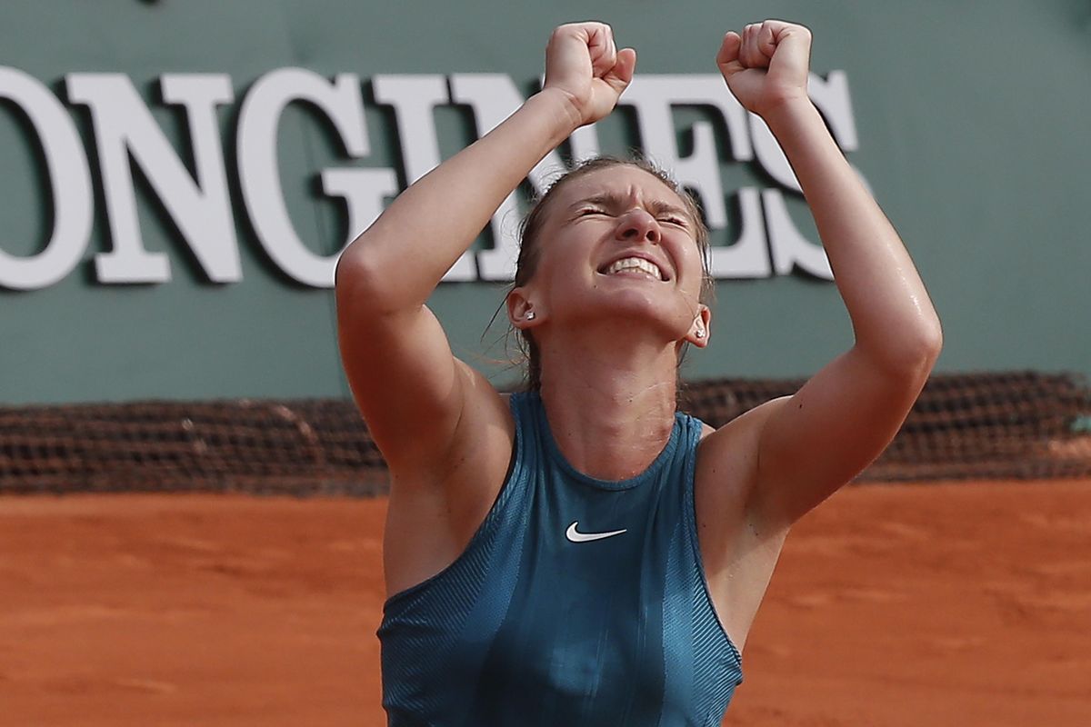 In this June 9, 2018, file photo, Romania’s Simona Halep celebrates winning the final match of the French Open tennis tournament against Sloane Stephens of the U.S. in three sets, 3-6, 6-4, 6-1, at the Roland Garros stadium in Paris, France. Halep is expected to compete in the Wimbledon tennis tournament that begins Monday, July 2, 2018. (Michel Euler / Associated Press)