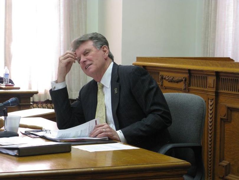 Gov. Butch Otter listens to arguments over cabin-site rents on state endowment lands on Tuesday. The state Land Board voted 3-2 - with Otter's support - to raise the rents an average of 9 percent a year for the next five years, or 54 percent total. (Betsy Russell)