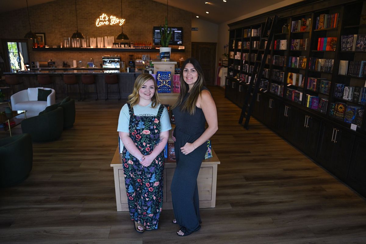 It’s A Love Story Books & Cafe owner Tyann Bjorkman, left, is photographed with operations manager Ashley Yates in Hayden on July 9.  (Kathy Plonka/The Spokesman-Review)