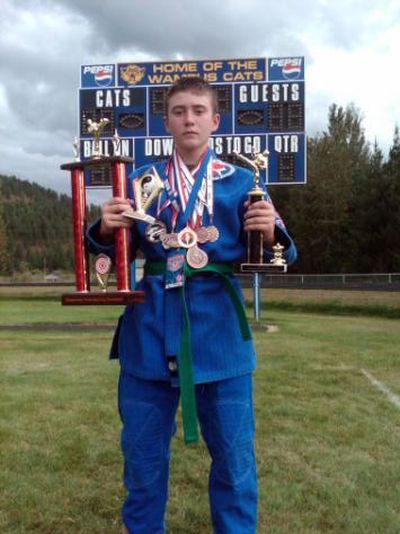 Tyler Hammack is seen with some of his trophies and medals. 