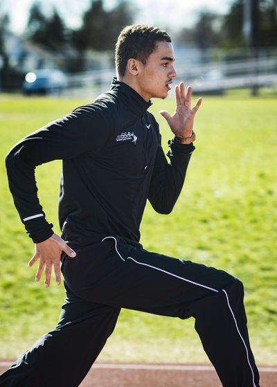Rogers sprinter Khalil Winfrey had state-winning times in the 100 and 200 last season, but was injured in regionals and missed out on the state meet. He is determined to show off his record-breaking speed this season. (Colin Mulvany / The Spokesman-Review)