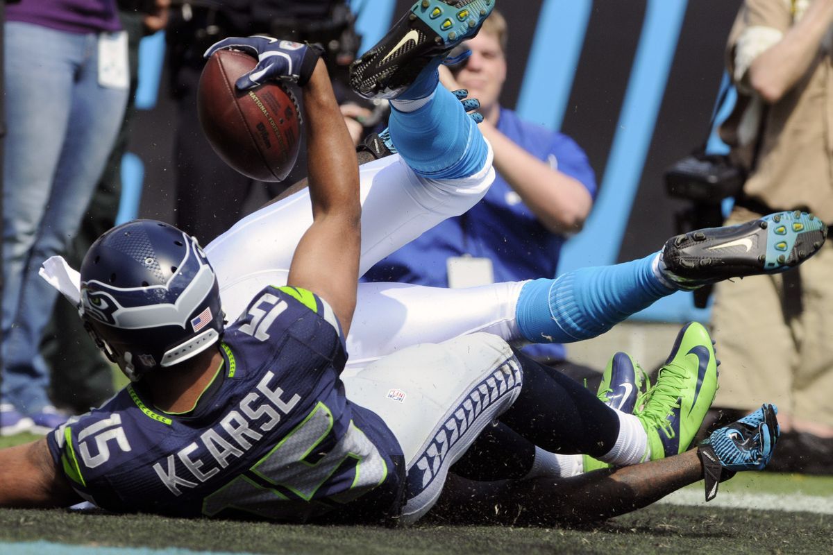 Seahawks receiver Jermaine Kearse displays the ball after scoring the go-ahead touchdown on Seattle’s first drive of the fourth quarter. (Associated Press)