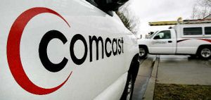 A technician for Comcast heads out on a job in Salt Lake City file photo. Comcast Corp., the nation's largest cable TV operator, said its net income for the first quarter more than tripled.
 (Associated Press / The Spokesman-Review)