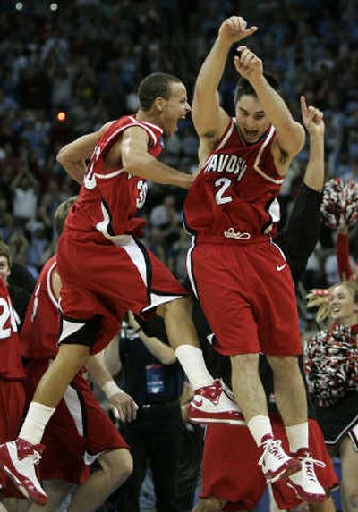 
Davidson's Stephen Curry, left, celebrates with teammate Jason Richards following a 74-70 win over Georgetown.Associated Press
 (Associated Press / The Spokesman-Review)