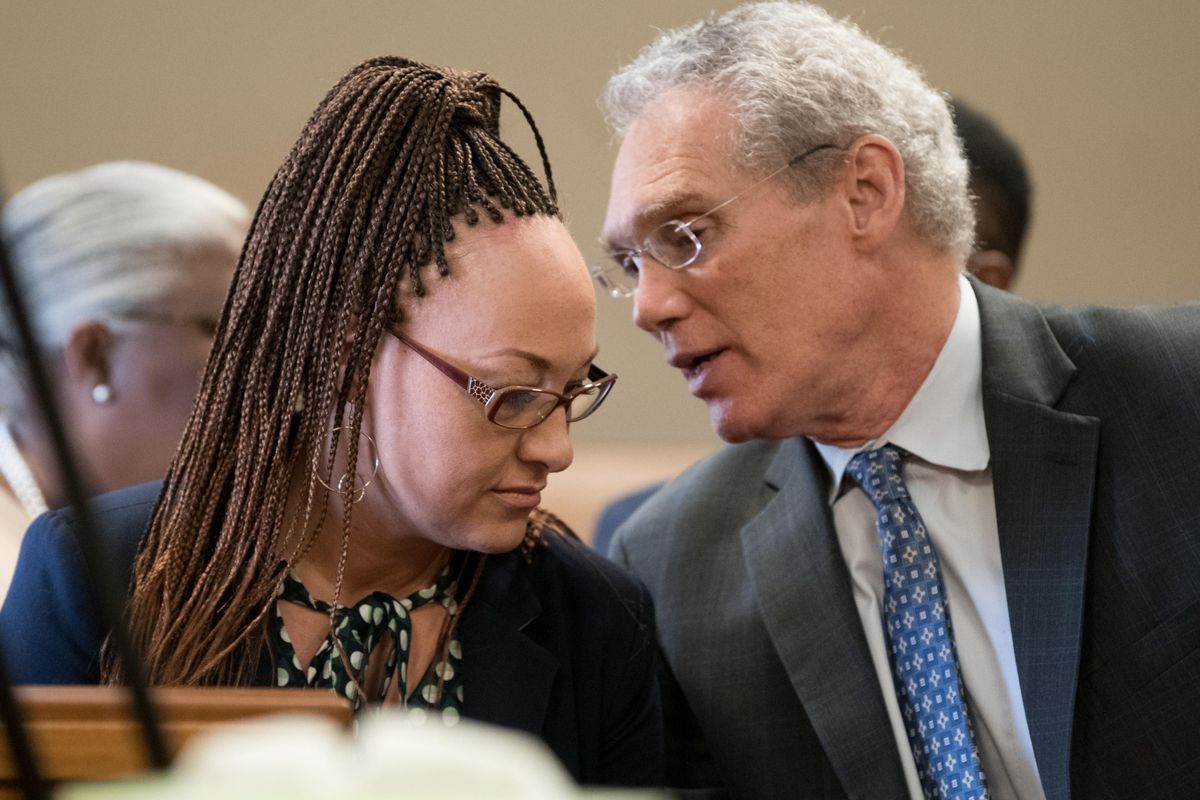 Rachel Dolezal, who now identifies as, Nkechi Diallo speaks with Bevan Maxey her attorney while she waits for an arraignment hearing on a felony charge of welfare fraud on Wednesday, June 20, 2018, at Spokane County Courthouse in Spokane, Wash. (Tyler Tjomsland / The Spokesman-Review)
