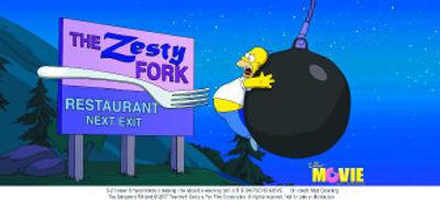 
The Movie: Homer Simpson takes a relaxing ride aboard a wrecking ball in 