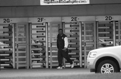 
A DaimlerChrysler employee leaves the Warren Truck Assembly Plant on Monday in Warren, Mich. 
 (Associated Press / The Spokesman-Review)
