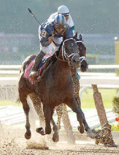
Jazil, with Fernando Jara aboard, wins the 138th Belmont Stakes on Saturday.  
 (Associated Press / The Spokesman-Review)