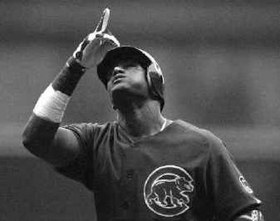 
Matters between and Chicago Cubs and Sammy Sosa are not looking up after the team fined its biggest star. 
 (Associated Press / The Spokesman-Review)