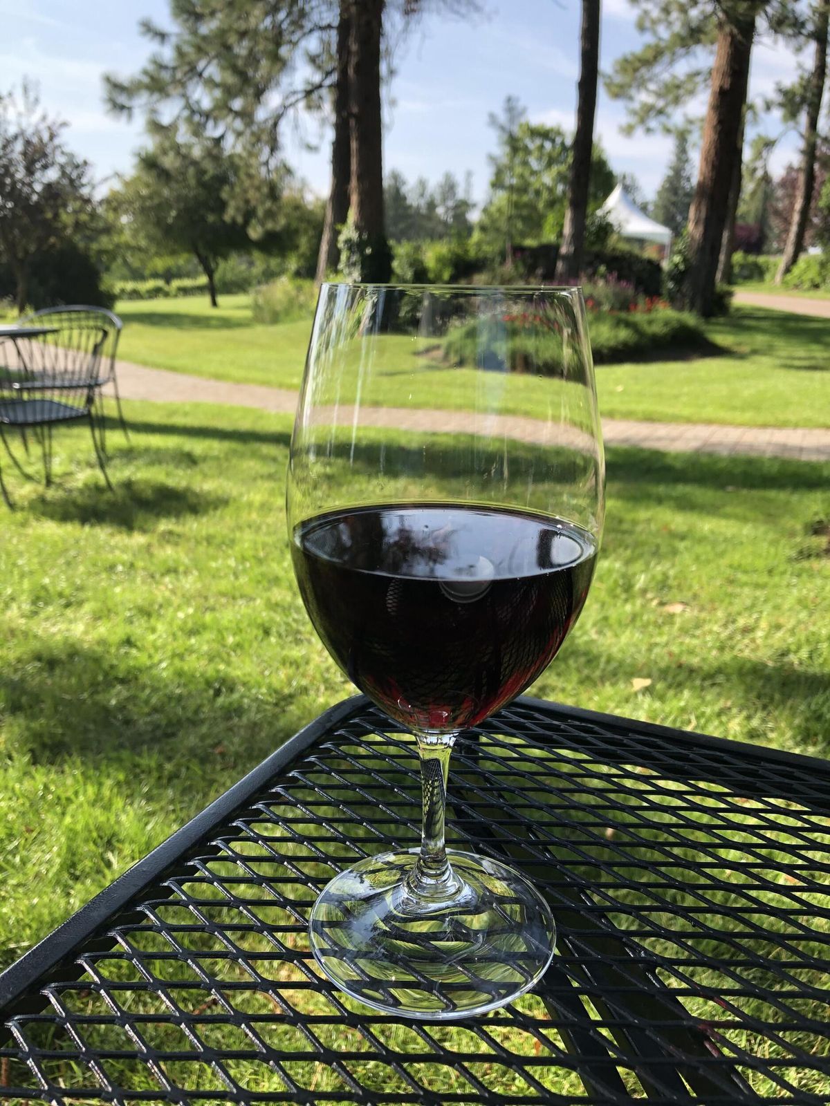 A glass of Bona Dea at Arbor Crest Wine Cellars in Spokane Valley on Friday, July 3, 2020. (Don Chareunsy/The Spokesman-Review)
