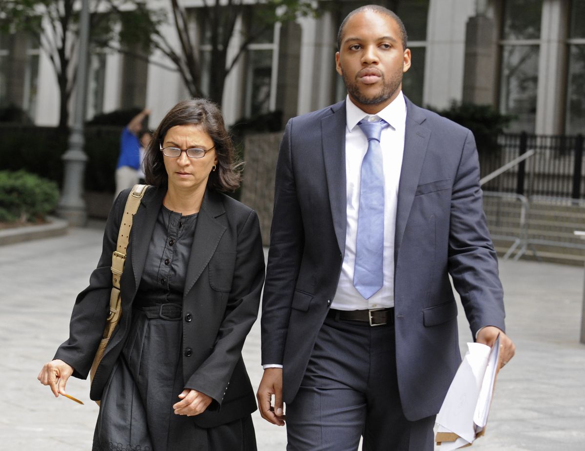 Federal defense attorneys Sabrina Shroff and Jerrod Thompson Hicks exit Manhattan federal court, Saturday, Oct. 6, 2012, in New York. Abu Hamza al-Masri, entered no plea to charges of conspiring with Seattle men to set up a terrorist training camp in Oregon and of helping abduct 16 hostages, two of them American tourists, in Yemen in 1998. (Louis Lanzano / Fr77522 Ap)