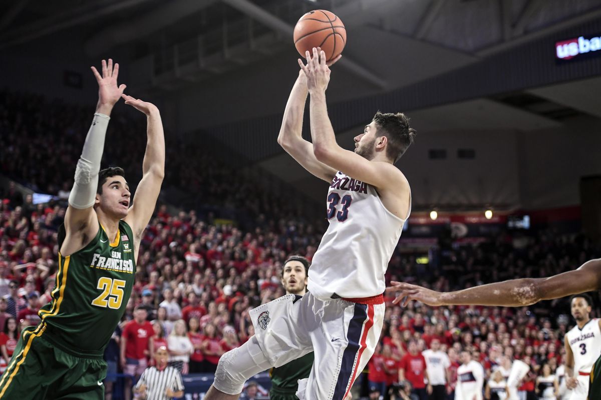 Gonzaga forward Killian Tillie is fouled by San Francisco forward Jordan Ratinho and makes the shot, Saturday, Jan. 27, 2018, in the McCarthey Athletic Center. (Dan Pelle / The Spokesman-Review)