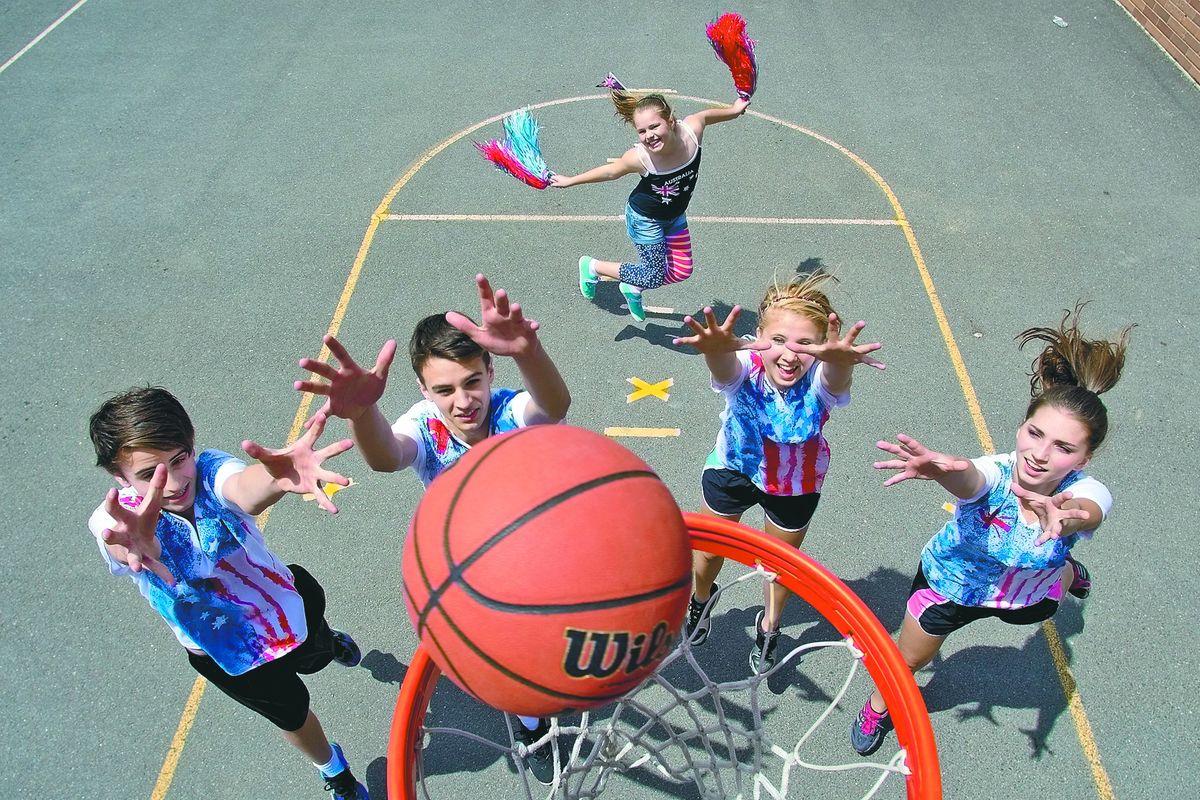 From left, Jackson Hayes, 13, his brother Mason, 16, and their cheerleader sister, Cora Hayes, 11, of Melbourne, Australia, will join forces with Sierra Haack, 16, of Reardan, and Joanna Tsarbopoulos, 17, of Colbert, in Hoopfest 2013. Their first practice together was last Sunday. (Dan Pelle)