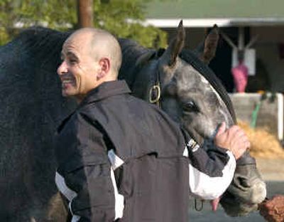 
Jockey Mike Smith and Kentucky Derby winner Giacomo shocked the horse racing world on Saturday.
 (Associated Press / The Spokesman-Review)