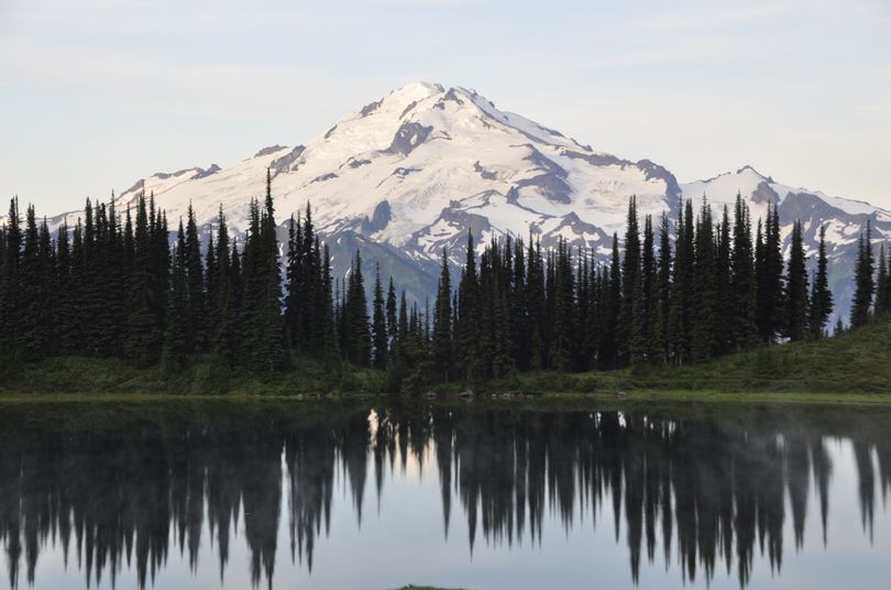 Backed by Glacier Peak, Image Lake is an iconic wilderness destination likely to be much more crowded if an access road is restored. (Rich Landers)