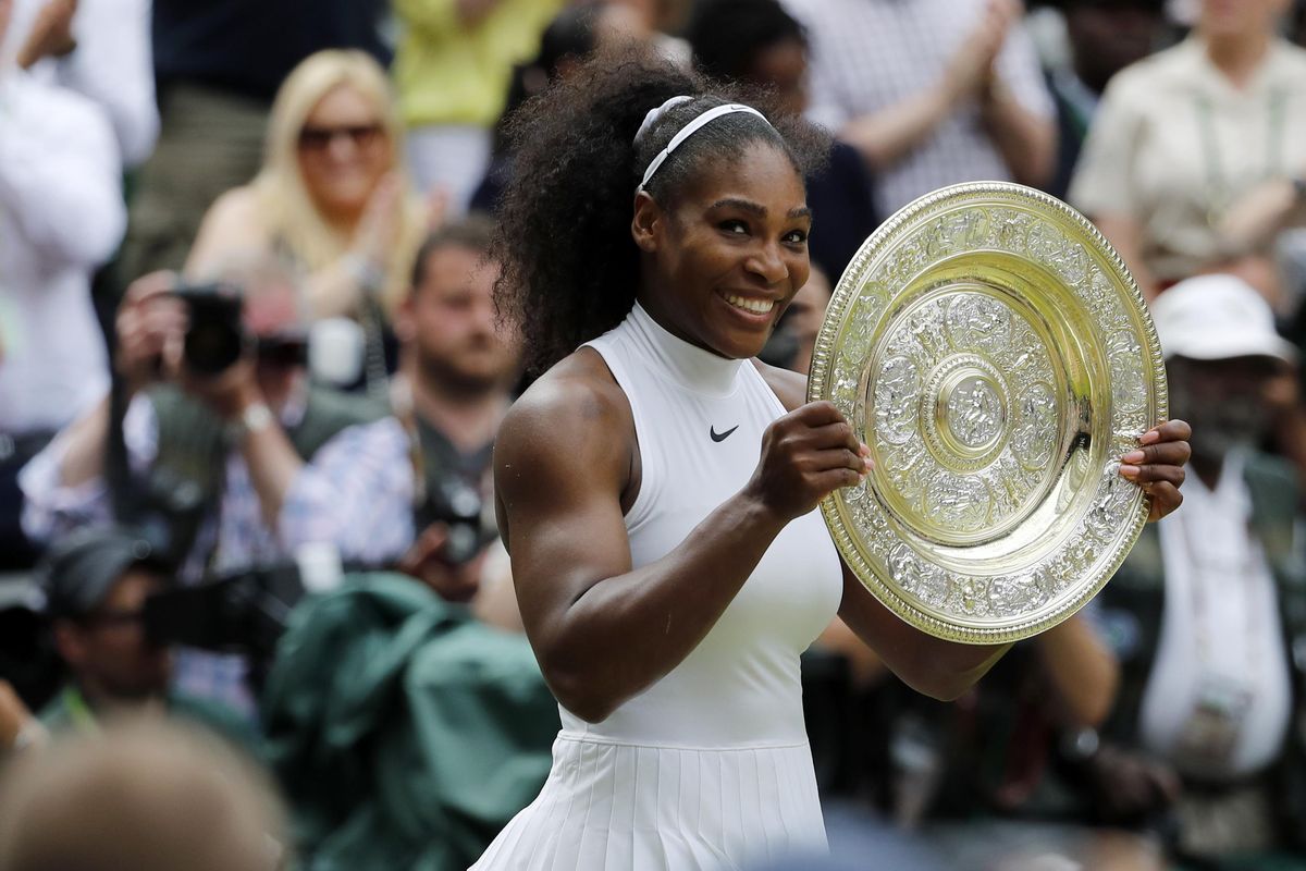 In this July 9, 2016, file photo, Serena Williams holds her trophy after winning the women’s singles final against Angelique Kerber of Germany at the Wimbledon Tennis Championships in London. Serena Williams was seeded No. 25 for her return to Wimbledon after having a baby, a decision by the All England Club announced Wednesday, June 27, 2018, that elevates the tournament’s seven-time champion above her ranking of 183rd. (Ben Curtis / Associated Press)