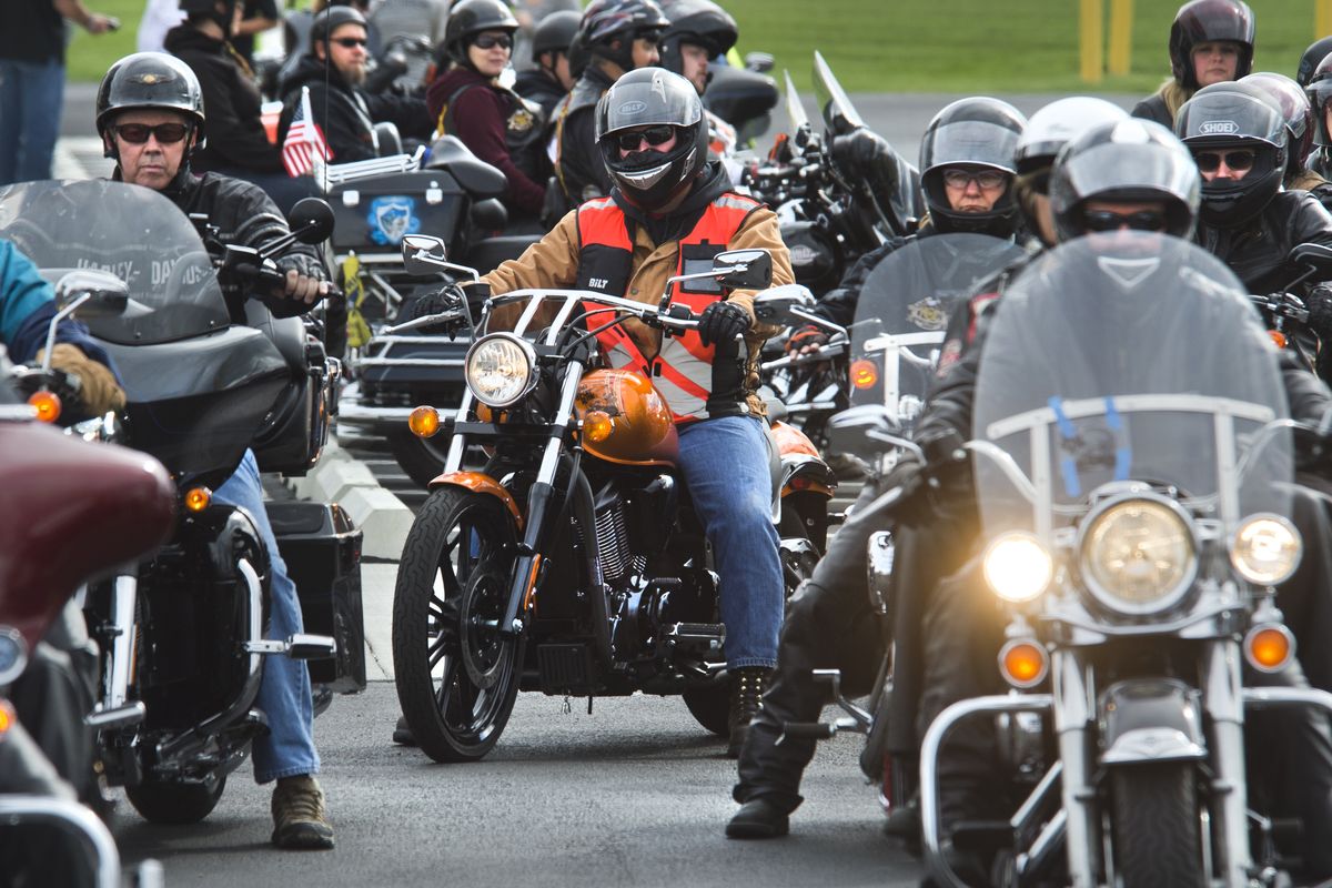 Motorcyclists line up for the start of the Bug Splat Ride on Saturday morning, which took off from Lone Wolf Harley-Davidson in Spokane Valley. The bikers went out through Tiger, Wash., and finished with a barbecue at the American Legion Hall in Chewelah. (Dan Pelle)