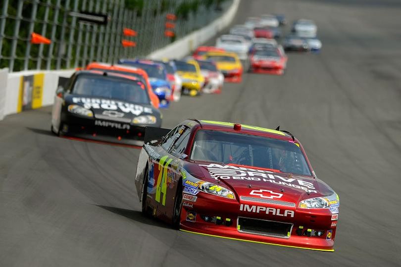 Jeff Gordon, driver of the #24 Drive to End Hunger Chevrolet, leads a pack of cars during the NASCAR Sprint Cup Series Pennsylvania 400 at Pocono Raceway on August 5, 2012 in Long Pond, Pennsylvania. (Photo by Jared C. Tilton/Getty Images) (Jared Tilton / Getty Images North America)