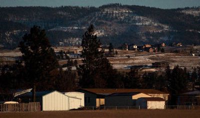 
High-end construction looms in the Liberty Lake hills behind the Greenacres Estates trailer park on Friday. The city of Liberty Lake wants to annex the park and surrounding lands. 
 (Photos by Brian Plonka / The Spokesman-Review)