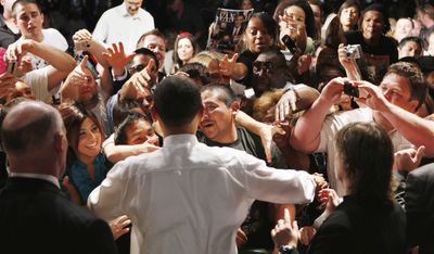 President Barack Obama greets the crowd in Costa Mesa, Calif., on Wednesday.  (Associated Press / The Spokesman-Review)