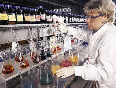 
A chemical laboratory technician works on products for the Bayer company. The average price increase for the top 30 brand-name drugs used by older Americans was 6.5 percent last year, the Families USA report said. AARP's study showed an average 6.9 percent price increase for nearly 200 drugs.A chemical laboratory technician works on products for the Bayer company. The average price increase for the top 30 brand-name drugs used by older Americans was 6.5 percent last year, the Families USA report said. AARP's study showed an average 6.9 percent price increase for nearly 200 drugs.
 (File/Associated PressFile/Associated Press / The Spokesman-Review)