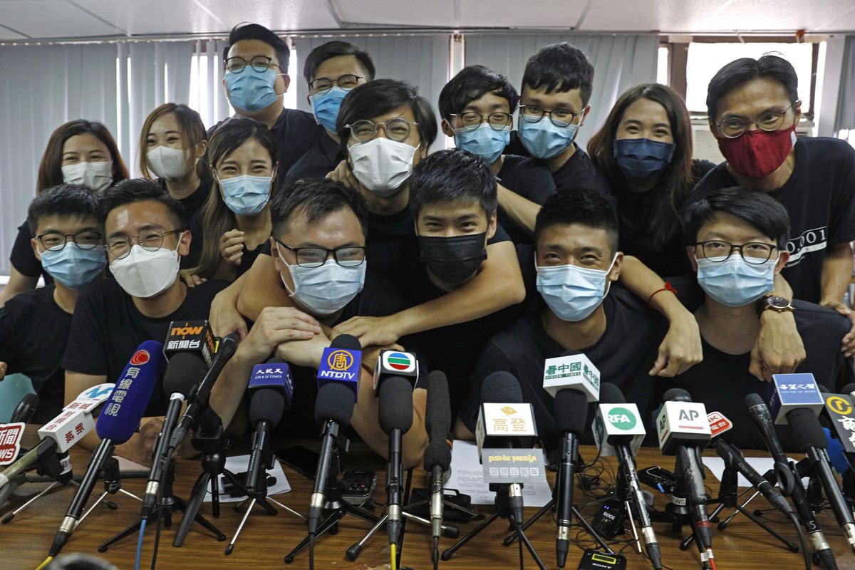 Pro-democracy activists who were elected from unofficial pro-democracy primaries attend a press conference July 15 in Hong Kong. About 50 Hong Kong pro-democracy figures were arrested by police on Wednesday.  (Kin Cheung)