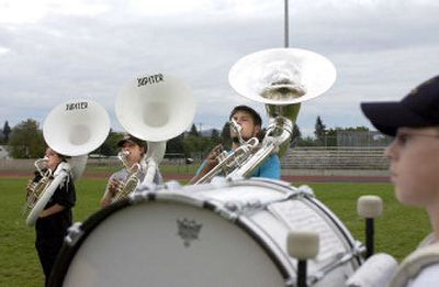 
West Valley High marching band members practice Monday. The band and cheerleaders will perform in the 2006 National Cherry Blossom Festival Parade in Washington, D.C. April 8.
 (Liz-Anne Kishimoto / The Spokesman-Review)