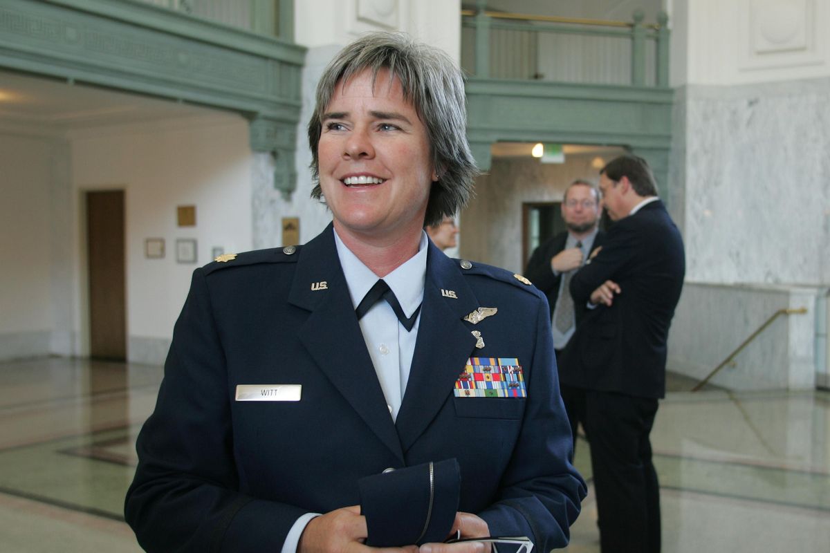 In this June 30, 2006 photo, U.S. Air Force Reservist Major Margaret Witt talks with reporters after a hearing of a case challenging her dismissal from the Air Force for being a Lesbian in U.S District Court in Tacoma. Witt retired with full benefits rather than resuming service during a announcement on May 10, 2011 at an American Civil Liberties Union news conference in Seattle. A federal judge ruled last fall that Witt’s dismissal violated her constitutional rights. The judge ordered that she be reinstated. Her lawyers and the government spent several months negotiating her reinstatement before finally reaching an agreement to let her retire. Her discharge will be erased from her records. Witt was dismissed in 2006 after serving 18 years. (JOHN FROSCHAUER / Associated Press)