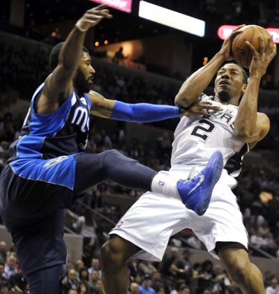 Forward Kawhi Leonard (2) scored 12 points in the Spurs’ victory. (Associated Press)
