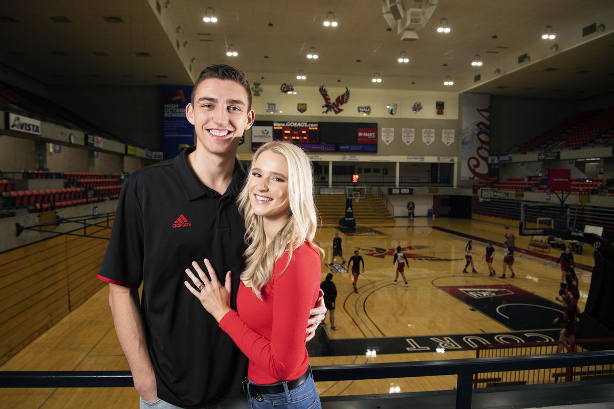 Eastern Washington University basketball player Mason Peatling, left, and wife Laura Peatling pose for a photo at Reese Court at EWU Tuesday, Feb. 11, 2020. The Peatlings are Australian. (Jesse Tinsley / The Spokesman-Review)