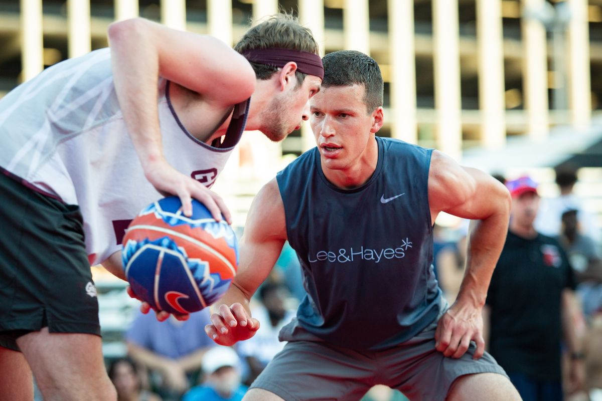 Bobby Moorehead of Bobby and the Boys looks for passing options while guarded by Parker Kelly of Lee and Hayes during the 2019 Hoopfest championship game for men’s elite 6 feet and over.  (Libby Kamrowski/THE SPOKESMAN-REVIEW)