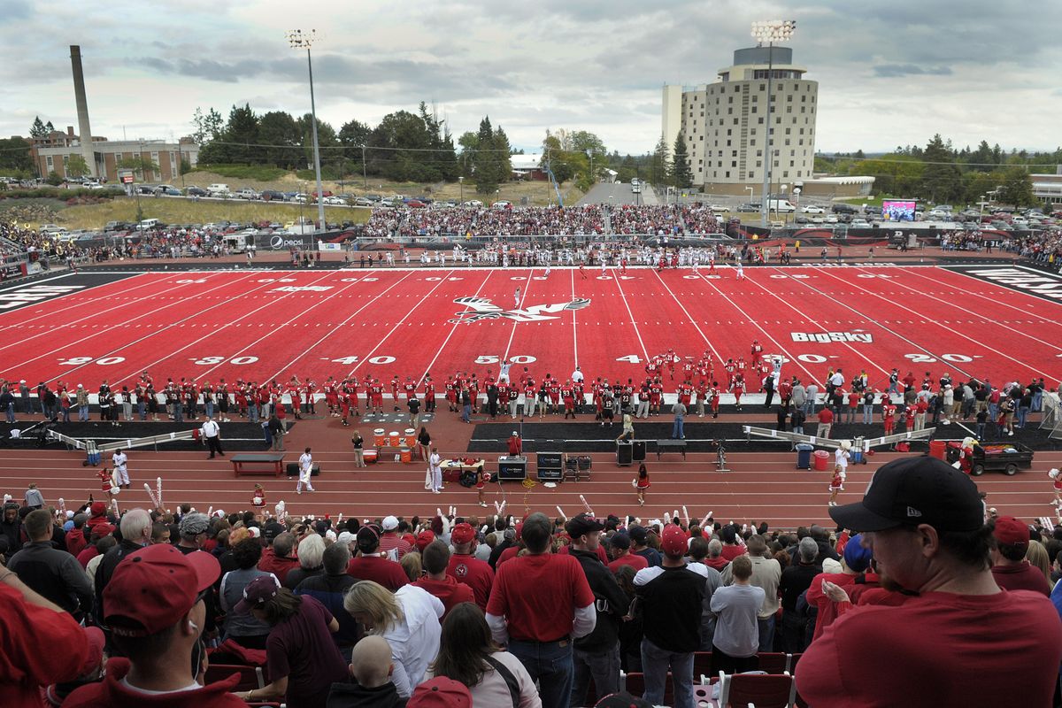 Eastern Washington University fans settle into their seats to enjoy the red turf of Roos Field on the Cheney campus Saturday, Sept. 18, 2010.  Eastern won their first game on the new red artificial turf 36-27. (Christopher Anderson / The Spokesman-Review)