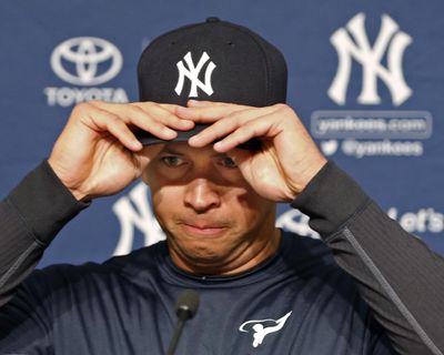 New York Yankees designated hitter Alex Rodriguez puts on his cap before announcing on Sunday that Friday will be his last game as a player. (Kathy Willens / Associated Press)