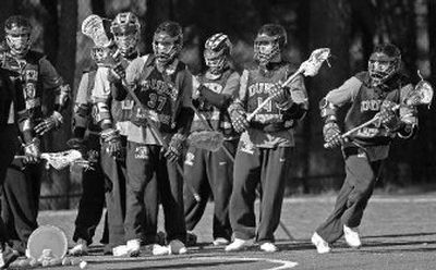 
Members of Duke's lacrosse team ran through drills during the team's first practice on Jan. 26 in Durham, N.C. 
 (Associated Press / The Spokesman-Review)