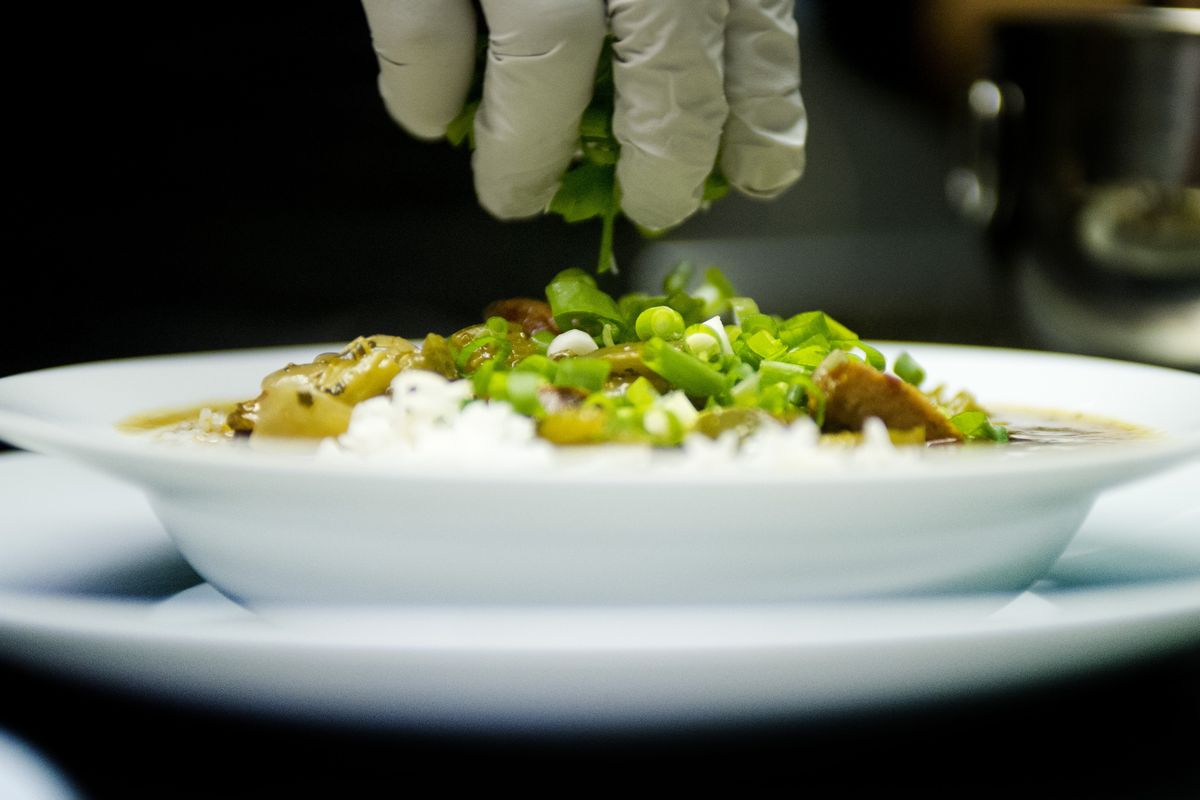 Blue Table Kitchen puts the final garnish on its gumbo.