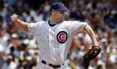 
Kerry Wood was told the stiffness in his shoulder is part of the healing process.
 (Associated Press / The Spokesman-Review)