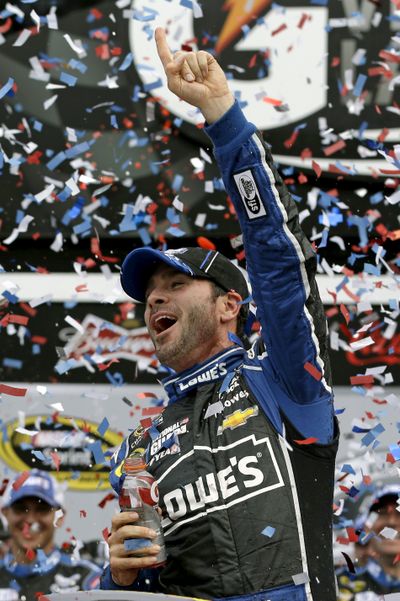 Jimmie Johnson celebrates in Victory Lane after winning the Daytona 500 for the second time.