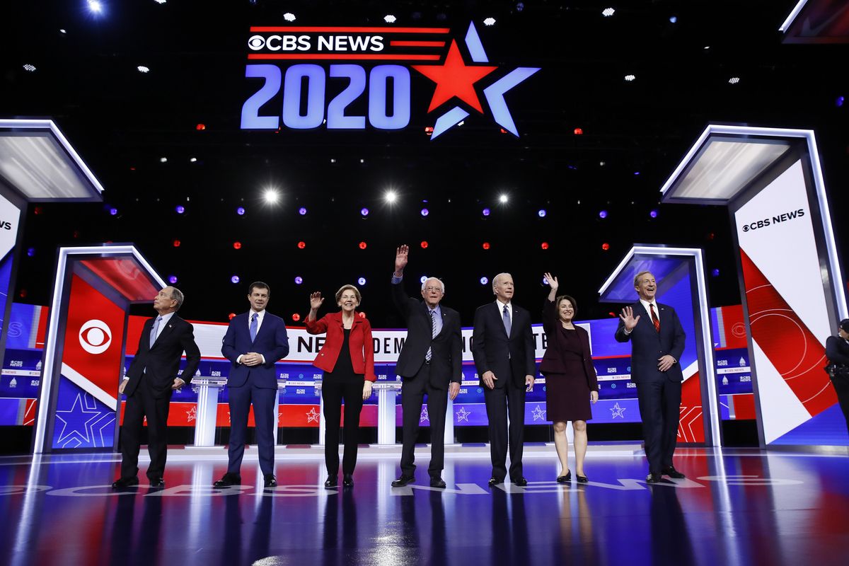 From left, former New York City Mayor Mike Bloomberg, former South Bend Mayor Pete Buttigieg, Sen. Elizabeth Warren, D-Mass., Sen. Bernie Sanders, I-Vt., former Vice President Joe Biden, Sen. Amy Klobuchar, D-Minn., and businessman Tom Steyer participate in a Democratic presidential primary debate Tuesday, Feb. 25, 2020, in Charleston, S.C. A poll of voters in the state of Washington  released Wednesday found that many Democrats remain undecided ahead of the March 10 primary. (Matt Rourke / AP)