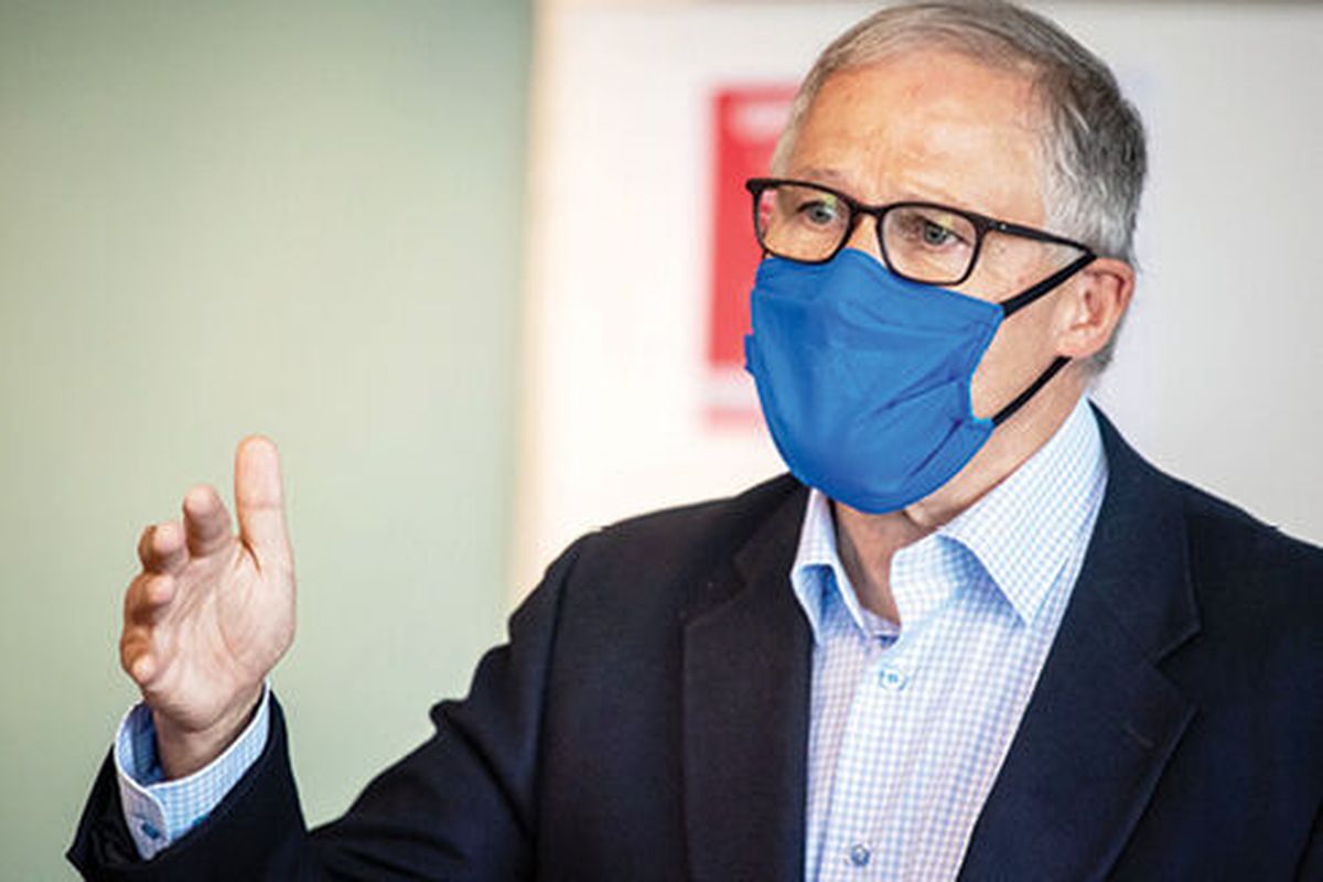 Gov. Jay Inslee is pictured wearing a mask.  (SR)