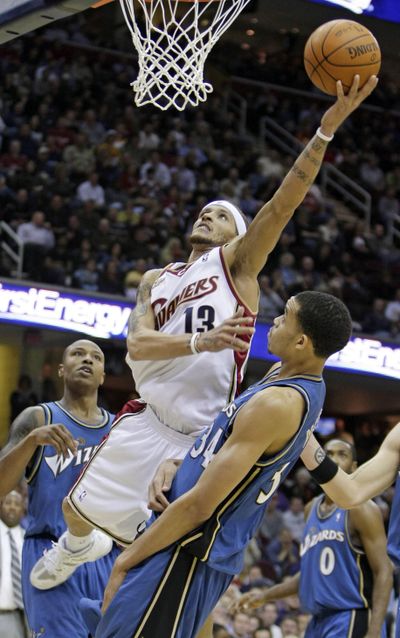 Cavs’ Delonte West (13) was indicted on more weapons charges.  (Associated Press / The Spokesman-Review)