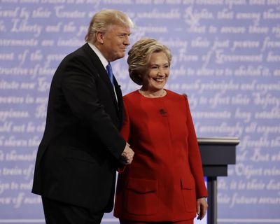 Democratic presidential nominee Hillary Clinton shakes hands with Republican presidential nominee Donald Trump during the presidential debate at Hofstra University in Hempstead, N.Y., Monday, Sept. 26, 2016. (Julio Cortez / AP)