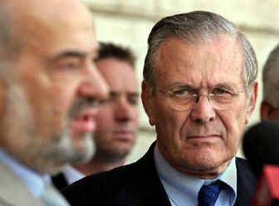 Donald Rumsfeld listens to Iraqi Prime Minister Ibrahim al-Jaafari in Iraq.
(Associated Press / The Spokesman-Review)