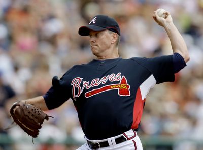 A sore shoulder has Tom Glavine mulling retirement. (Associated Press / The Spokesman-Review)