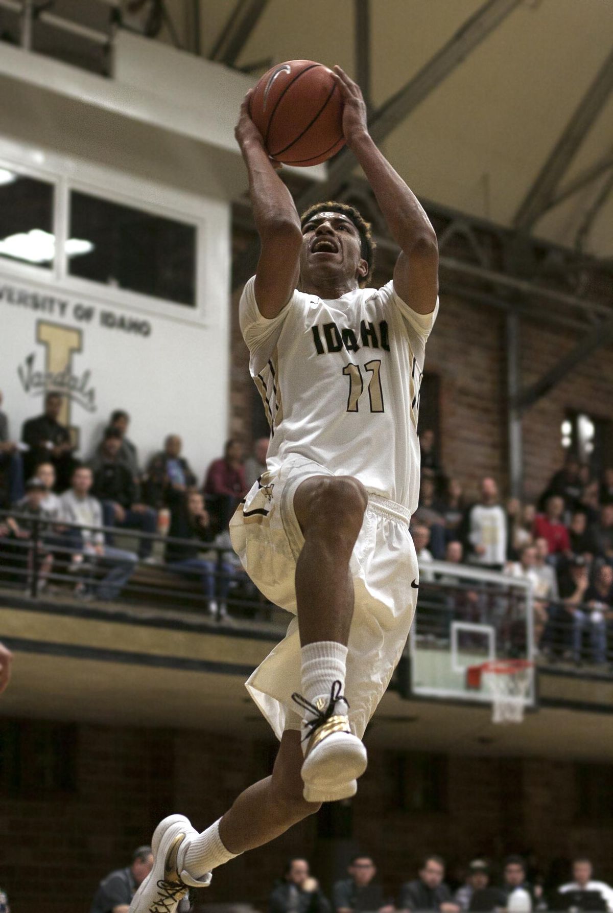 Idaho guard Victor Sanders drives to the rim after a steal in the first period against Corban University in the Memorial Gym in Moscow on Feb. 22, 2017. (Tess Fox)