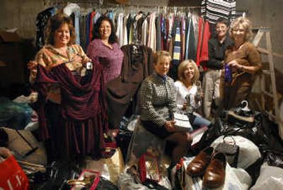 
The Wardrobes for Women committee, from left: Tracie Schillinger, Kathy Dopson, Ginger Cohen, Paula Johnson, Amanda Livingston and chairperson Anne Fritz.
 (Photos by Holly Pickett/ / The Spokesman-Review)