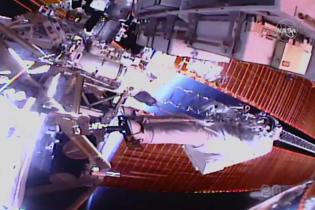 In this image taken from NASA video, NASA astronaut Chris Cassidy works outside the International Space Station on Thursday, July 16, 2020. Cassidy and Bob Behnken ventured out on their third spacewalk over the past few weeks to remove six more old batteries in the space station’s power grid, and replace them with new, improved ones.  (HOGP)